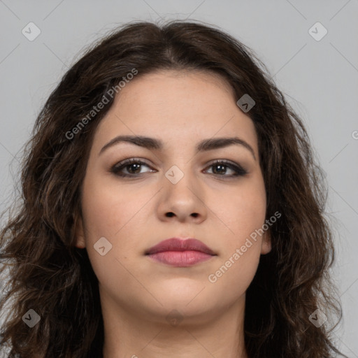 Neutral white young-adult female with long  brown hair and brown eyes