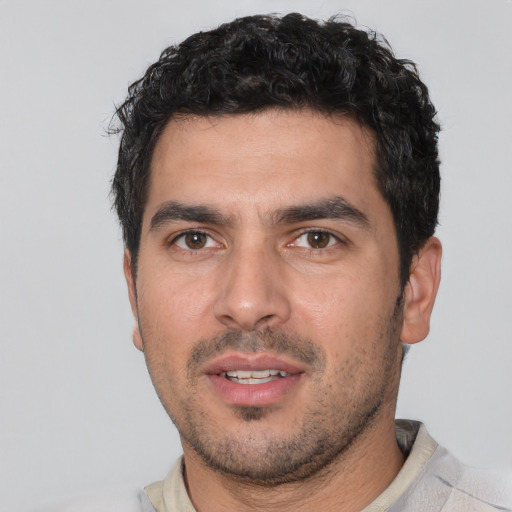 Neutral white young-adult male with short  black hair and brown eyes