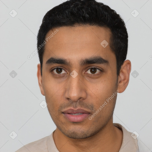 Neutral latino young-adult male with short  black hair and brown eyes