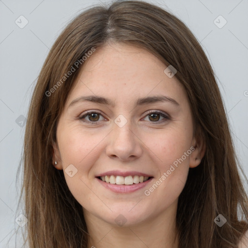 Joyful white young-adult female with long  brown hair and grey eyes