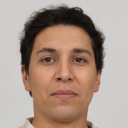 Neutral white adult male with short  brown hair and brown eyes