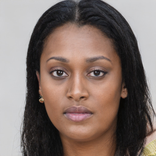 Neutral latino young-adult female with long  black hair and brown eyes