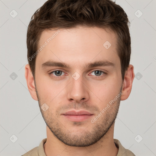 Neutral white young-adult male with short  brown hair and grey eyes