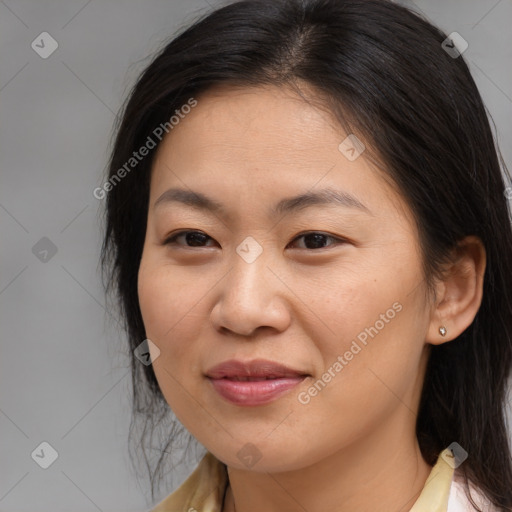 Joyful asian young-adult female with medium  brown hair and brown eyes