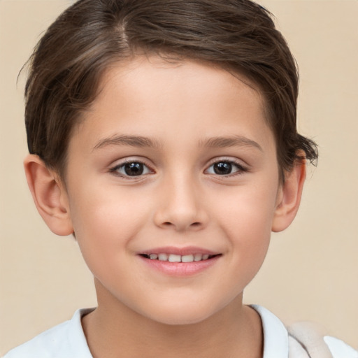 Joyful white child female with short  brown hair and brown eyes