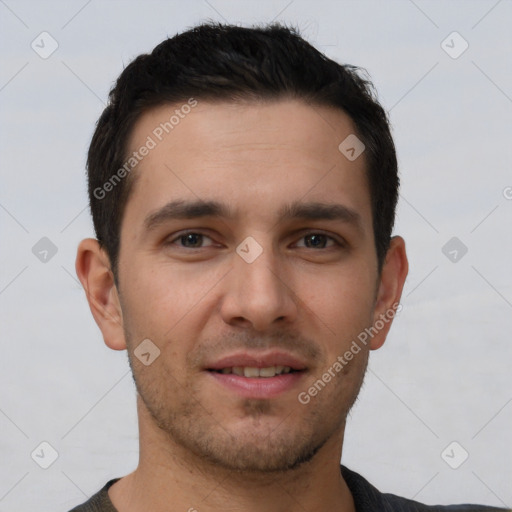 Joyful white young-adult male with short  brown hair and brown eyes