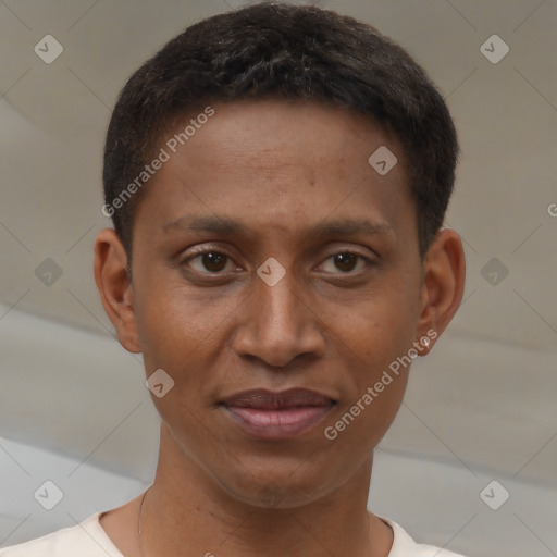 Joyful black young-adult male with short  brown hair and brown eyes