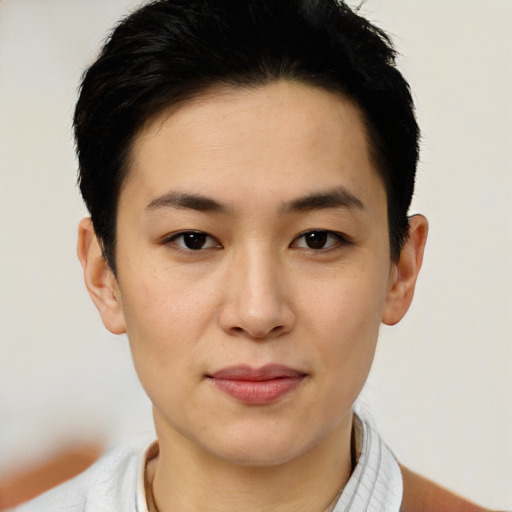 Joyful white young-adult female with short  black hair and brown eyes
