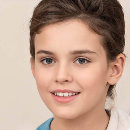 Joyful white child female with medium  brown hair and brown eyes