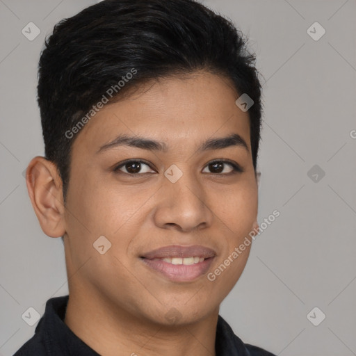 Joyful latino young-adult male with short  brown hair and brown eyes