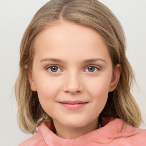 Joyful white child female with medium  brown hair and blue eyes