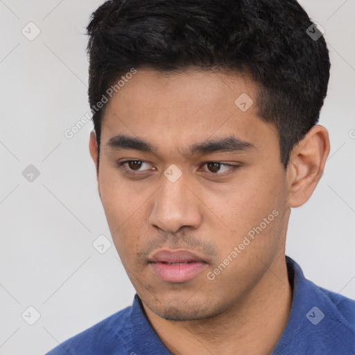 Neutral asian young-adult male with short  black hair and brown eyes