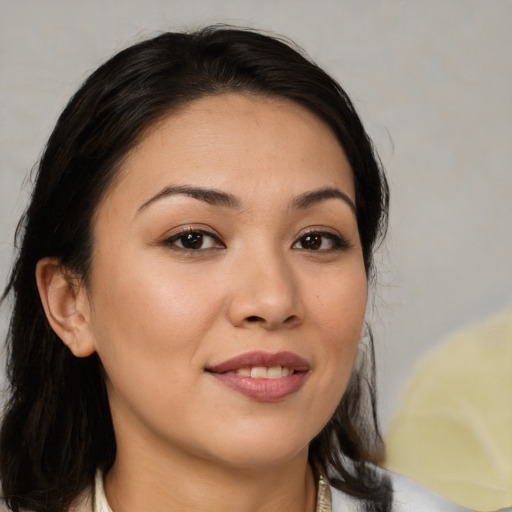 Joyful white young-adult female with medium  brown hair and brown eyes