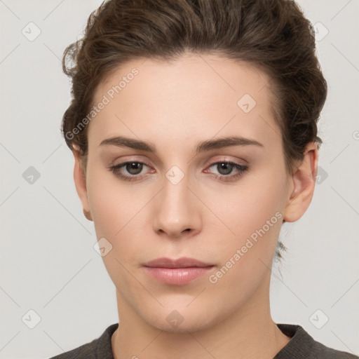 Neutral white young-adult female with short  brown hair and brown eyes