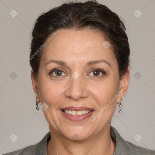 Joyful white adult female with short  brown hair and brown eyes