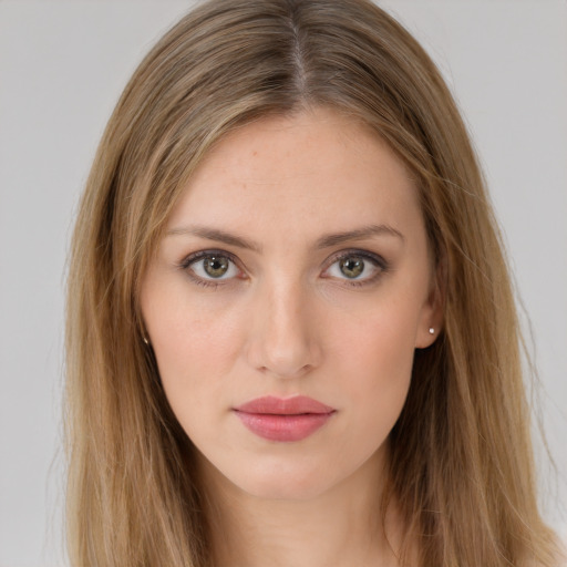 Neutral white young-adult female with long  brown hair and brown eyes