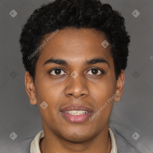 Joyful black young-adult male with short  brown hair and brown eyes