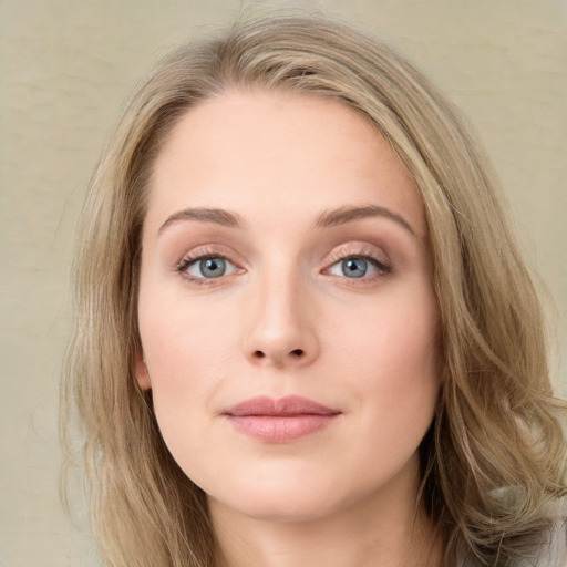 Neutral white young-adult female with long  brown hair and grey eyes