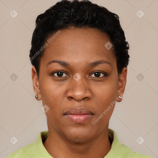 Joyful black young-adult female with short  black hair and brown eyes