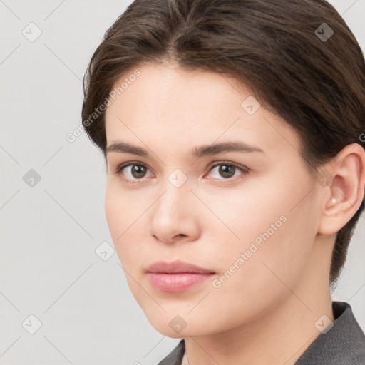 Neutral white young-adult female with short  brown hair and brown eyes