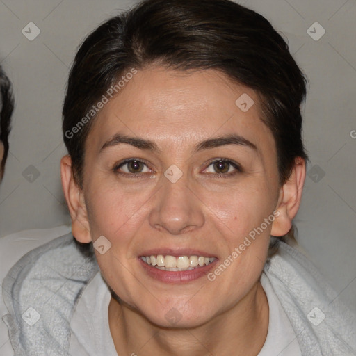 Joyful white adult female with medium  brown hair and brown eyes