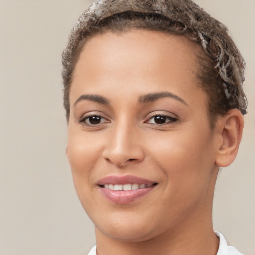 Joyful white young-adult female with short  brown hair and brown eyes