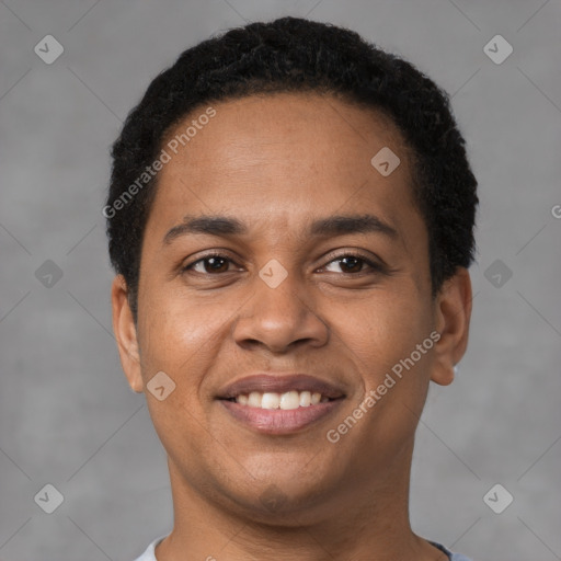 Joyful latino young-adult male with short  brown hair and brown eyes