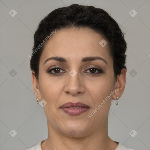 Joyful latino young-adult female with short  brown hair and brown eyes