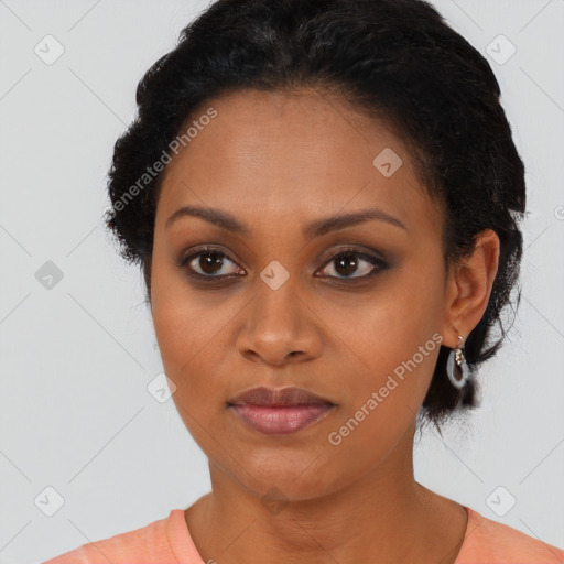 Joyful latino young-adult female with short  black hair and brown eyes