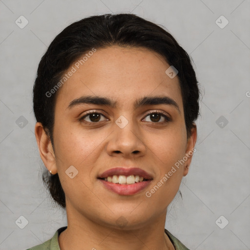 Joyful latino young-adult female with short  brown hair and brown eyes