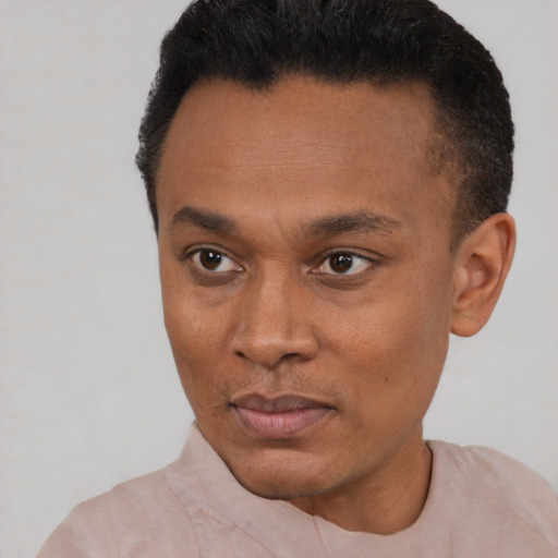Neutral black young-adult male with short  black hair and brown eyes