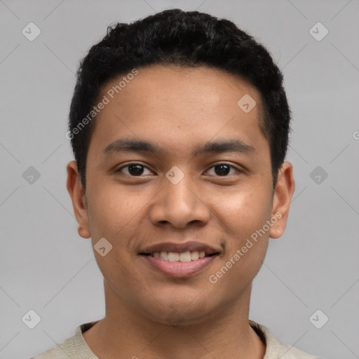 Joyful latino young-adult male with short  black hair and brown eyes