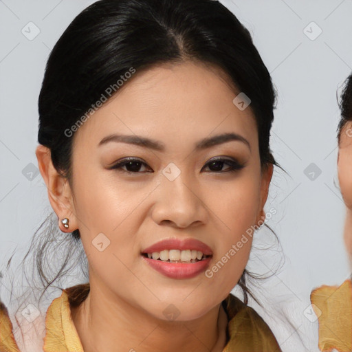 Joyful asian young-adult female with medium  brown hair and brown eyes