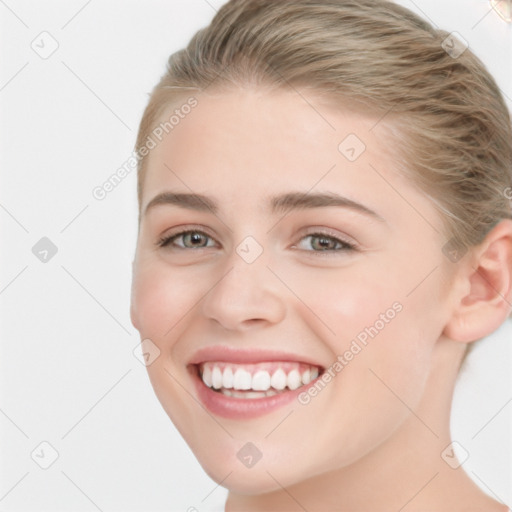 Joyful white young-adult female with medium  brown hair and blue eyes