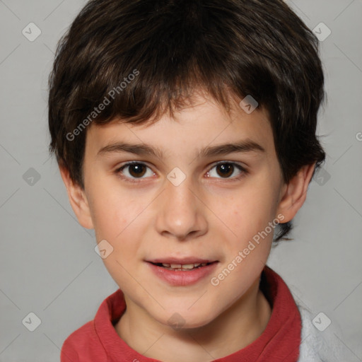 Joyful white child male with short  brown hair and brown eyes