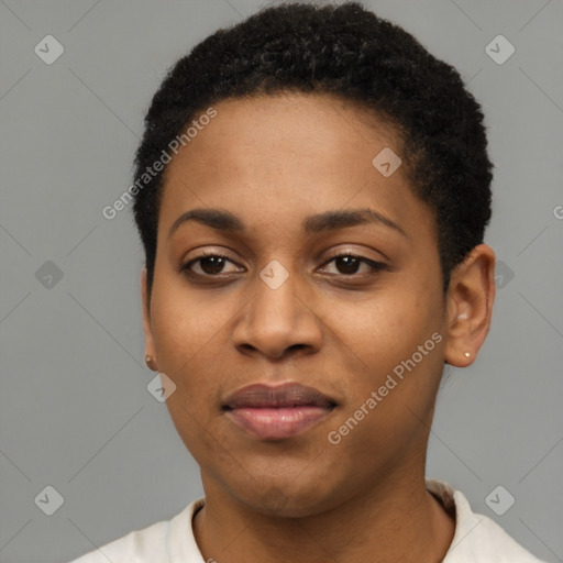 Joyful black young-adult female with short  black hair and brown eyes