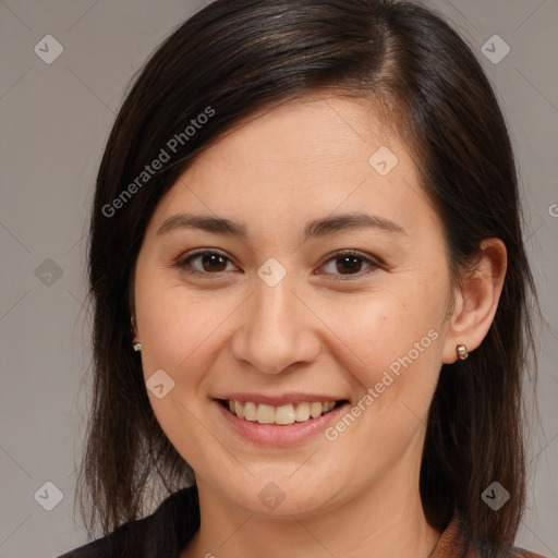 Joyful white young-adult female with long  brown hair and brown eyes