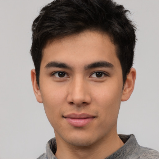 Neutral asian young-adult male with short  brown hair and brown eyes