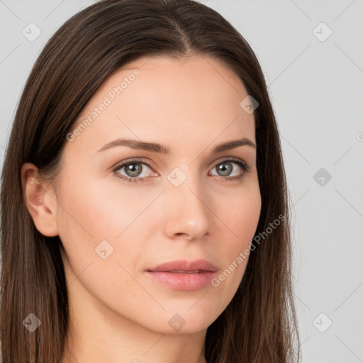 Neutral white young-adult female with long  brown hair and brown eyes