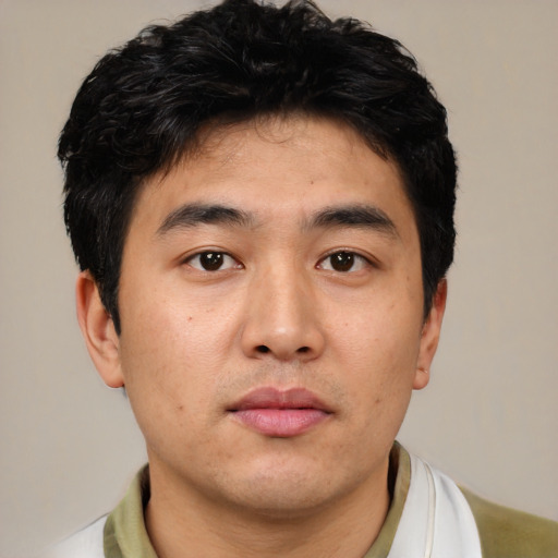 Neutral asian young-adult male with short  black hair and brown eyes