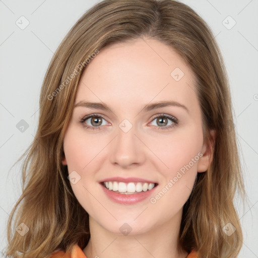 Joyful white young-adult female with medium  brown hair and green eyes