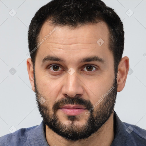 Neutral white young-adult male with short  black hair and brown eyes