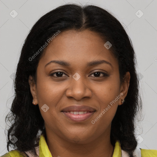 Joyful black young-adult female with medium  brown hair and brown eyes