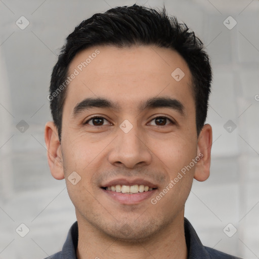 Joyful white young-adult male with short  black hair and brown eyes