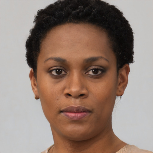 Neutral black young-adult female with short  brown hair and brown eyes