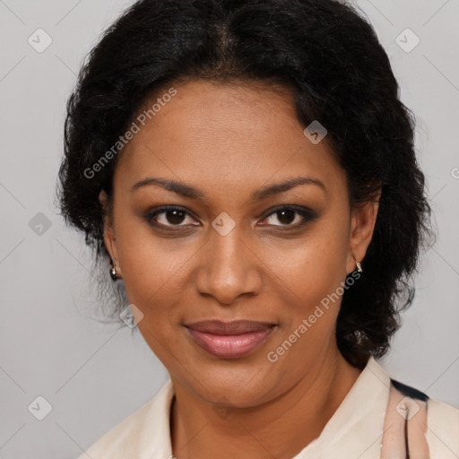 Joyful black adult female with medium  brown hair and brown eyes