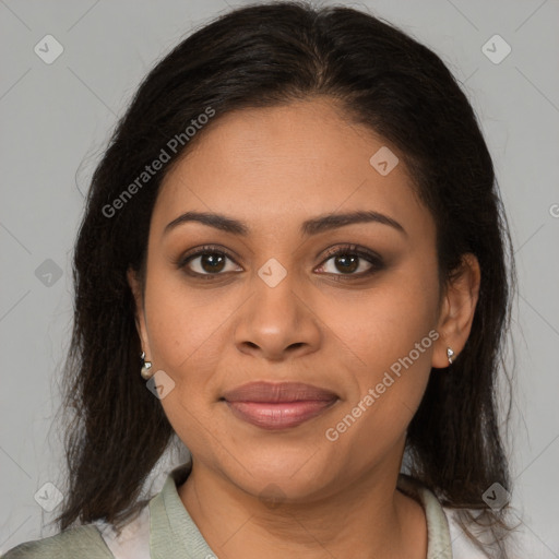 Joyful latino young-adult female with medium  brown hair and brown eyes