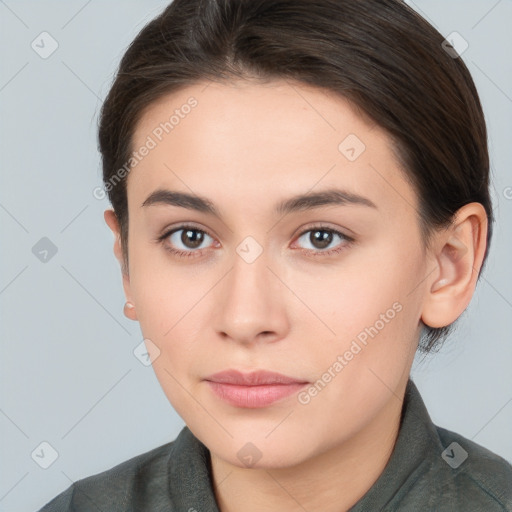 Neutral white young-adult female with medium  brown hair and brown eyes