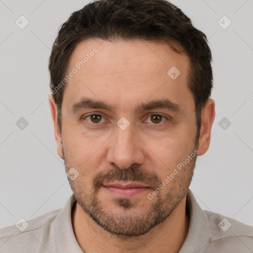 Joyful white adult male with short  brown hair and brown eyes