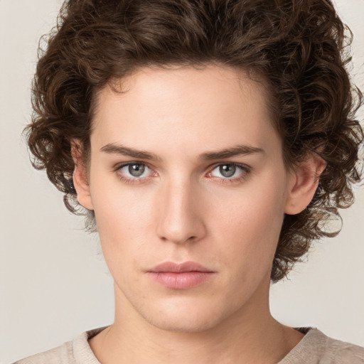 Neutral white young-adult female with medium  brown hair and green eyes